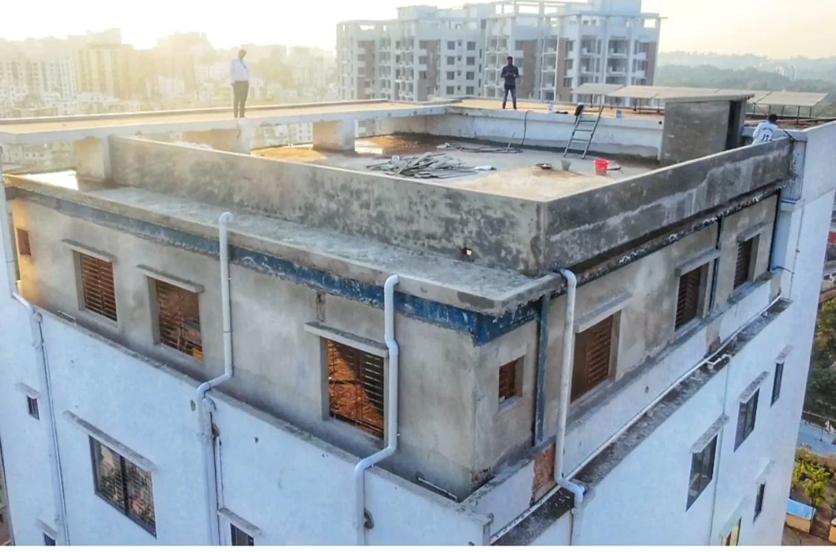 Existing concrete rooftop photographed before proposed steel work